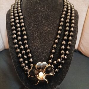 Elegant Black Beaded Necklace with Floral Accent